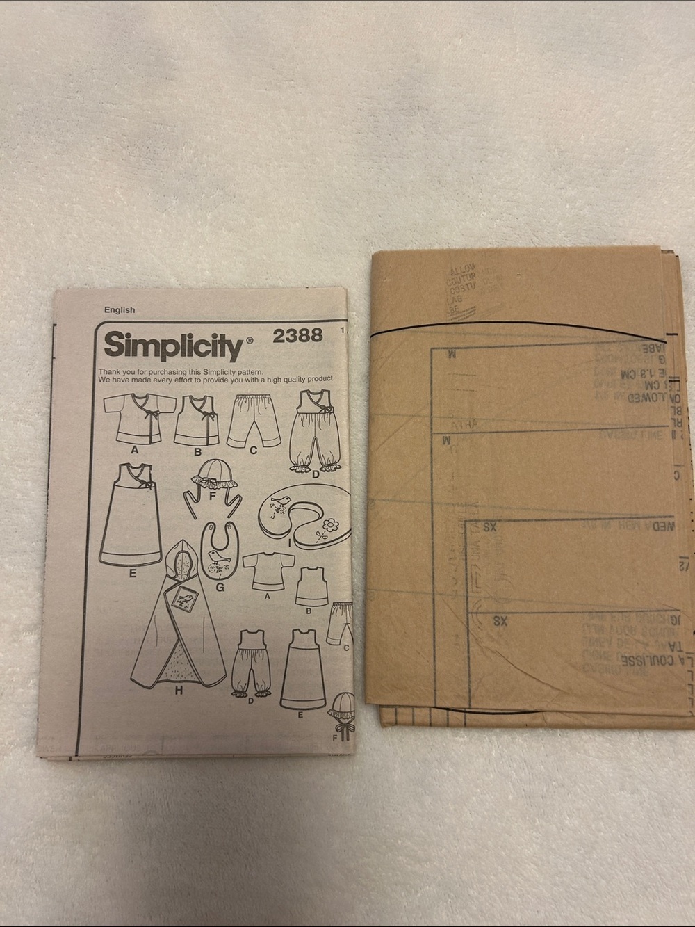 Uncut Simplicity Pattern 2388 Happy Baby Babies' Layette and Hat Size A XXS - L - Picture 3 of 4